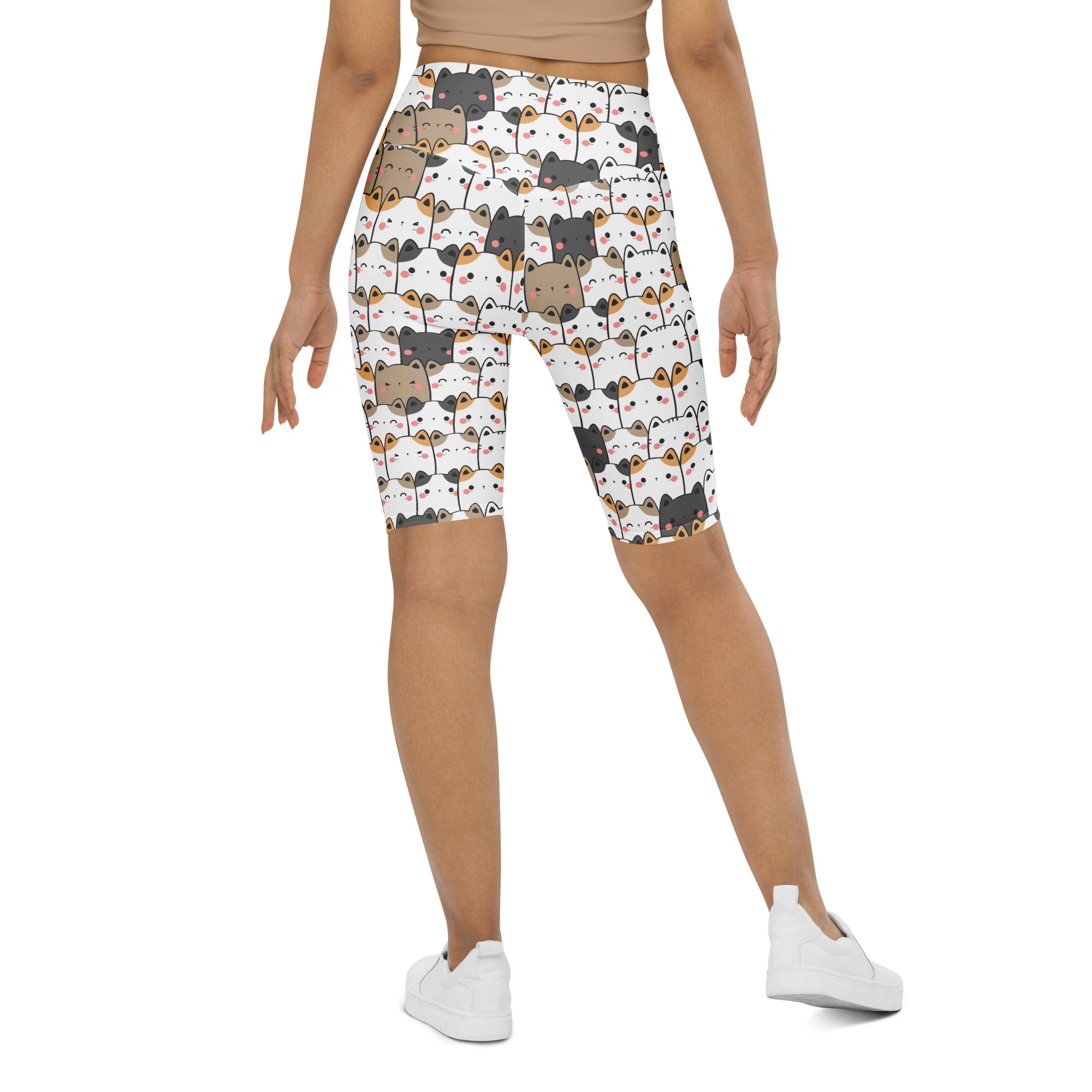 White women’s kawaii cat high waisted biker shorts with a playful multicolor cartoon cat pattern and moisture wicking fabric