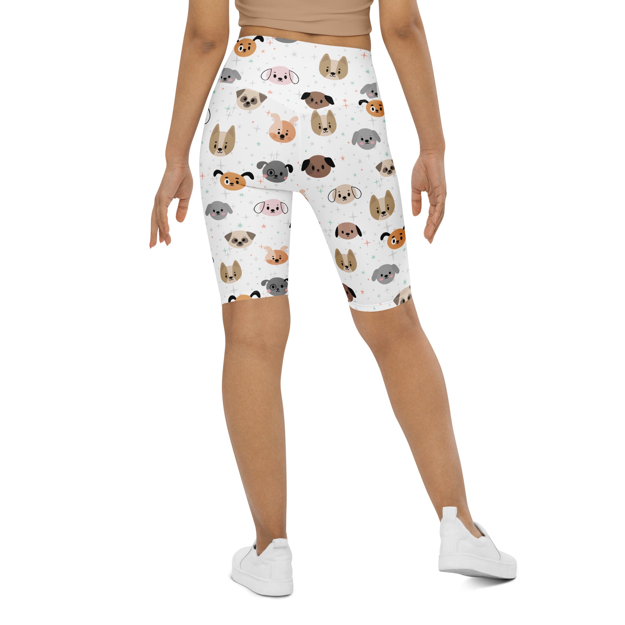 White women’s dog face high waisted biker shorts with moisture wicking fabric and colorful cartoon dog pattern