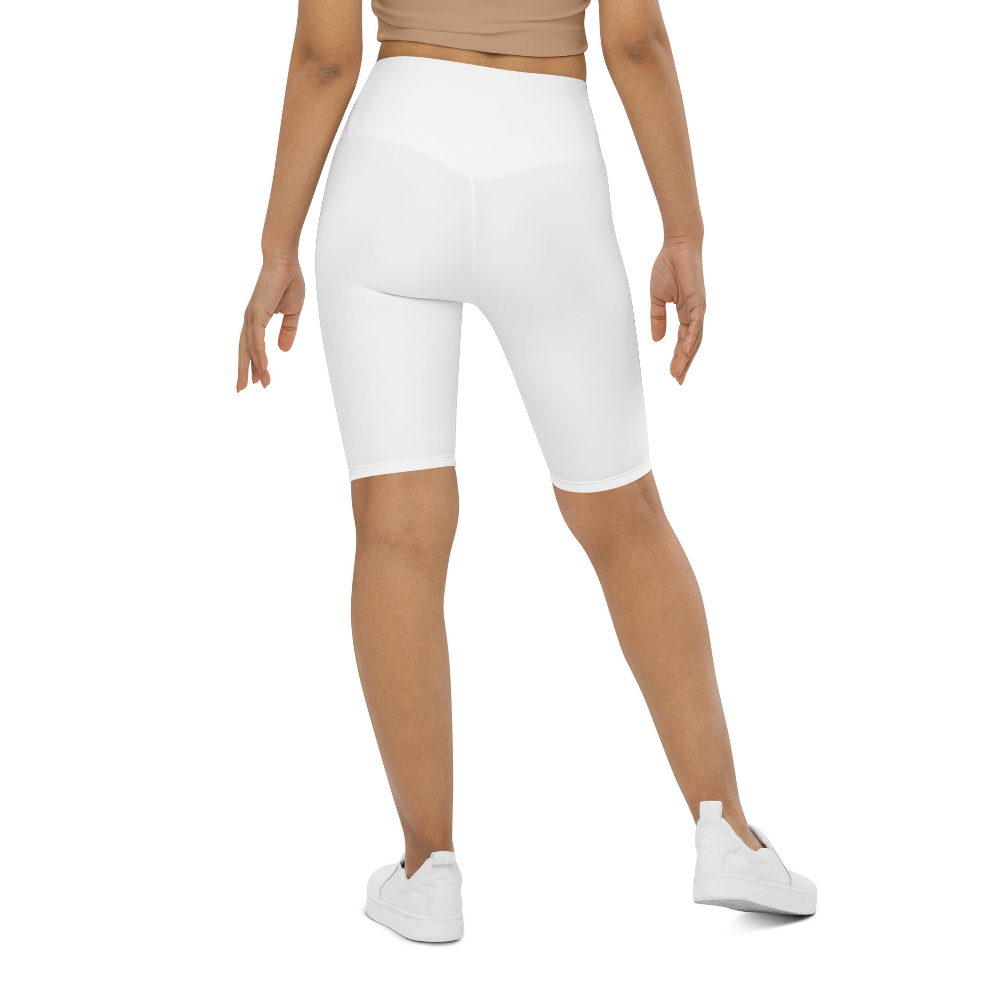 White high waisted biker shorts with smooth moisture wicking fabric for a form fitting active fit