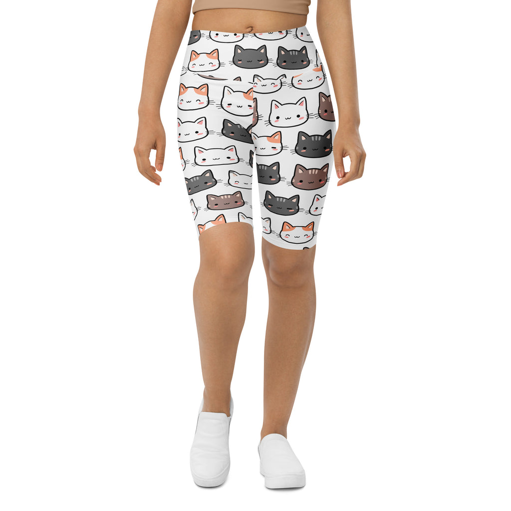 White leggings with playful colorful cartoon cat pattern high waisted moisture wicking for active wear