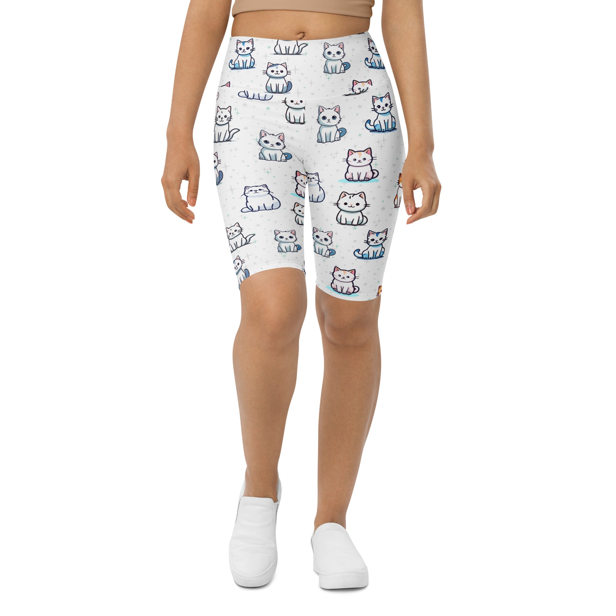 Women’s white cat high waisted biker shorts with playful cartoon cat pattern and light blue accents moisture wicking