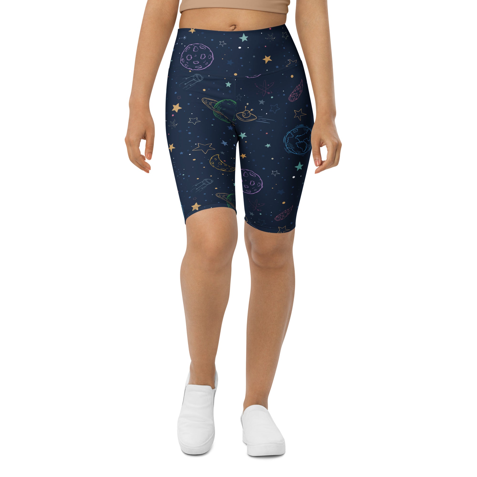 Women’s colorful galaxy space high waisted biker shorts in dark blue with rainbow planets stars and rockets moisture wicking