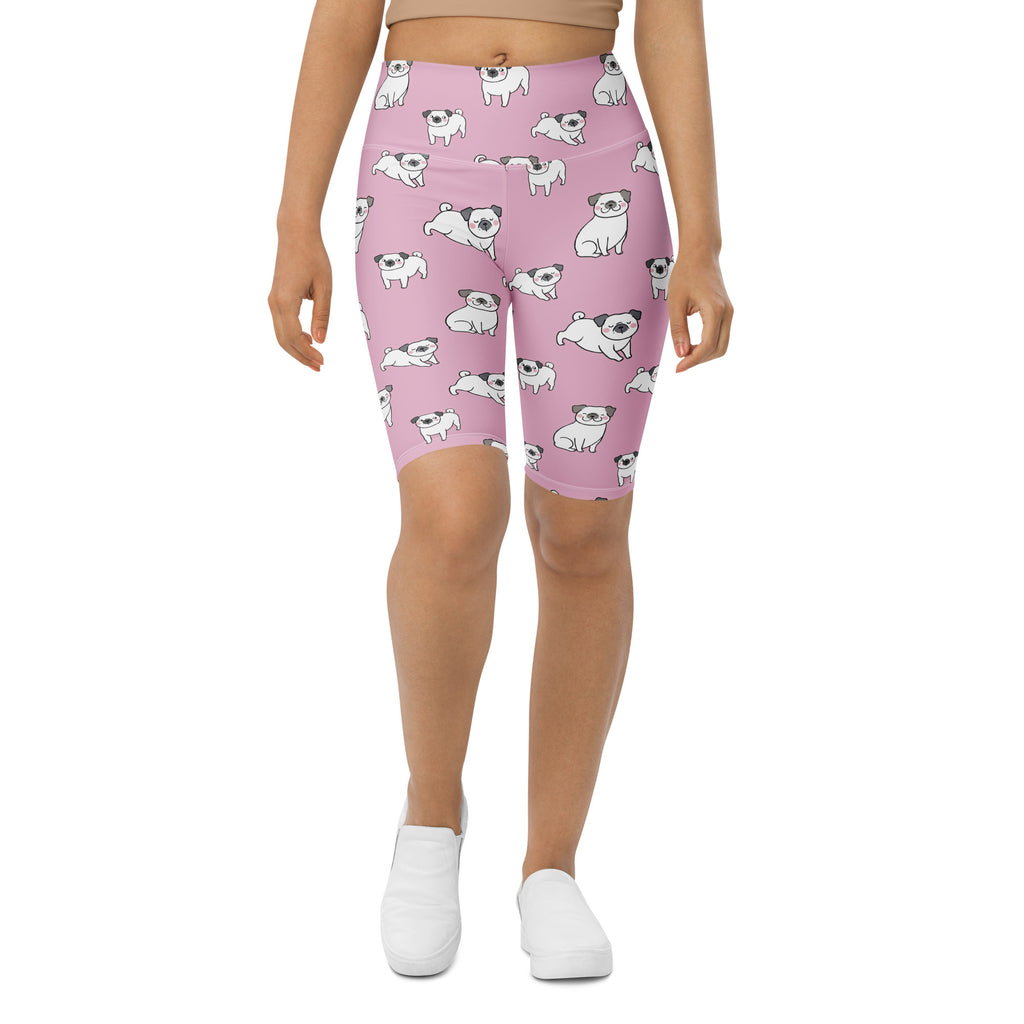 Women’s pink high waisted biker shorts with white pug pattern moisture wicking active fit material