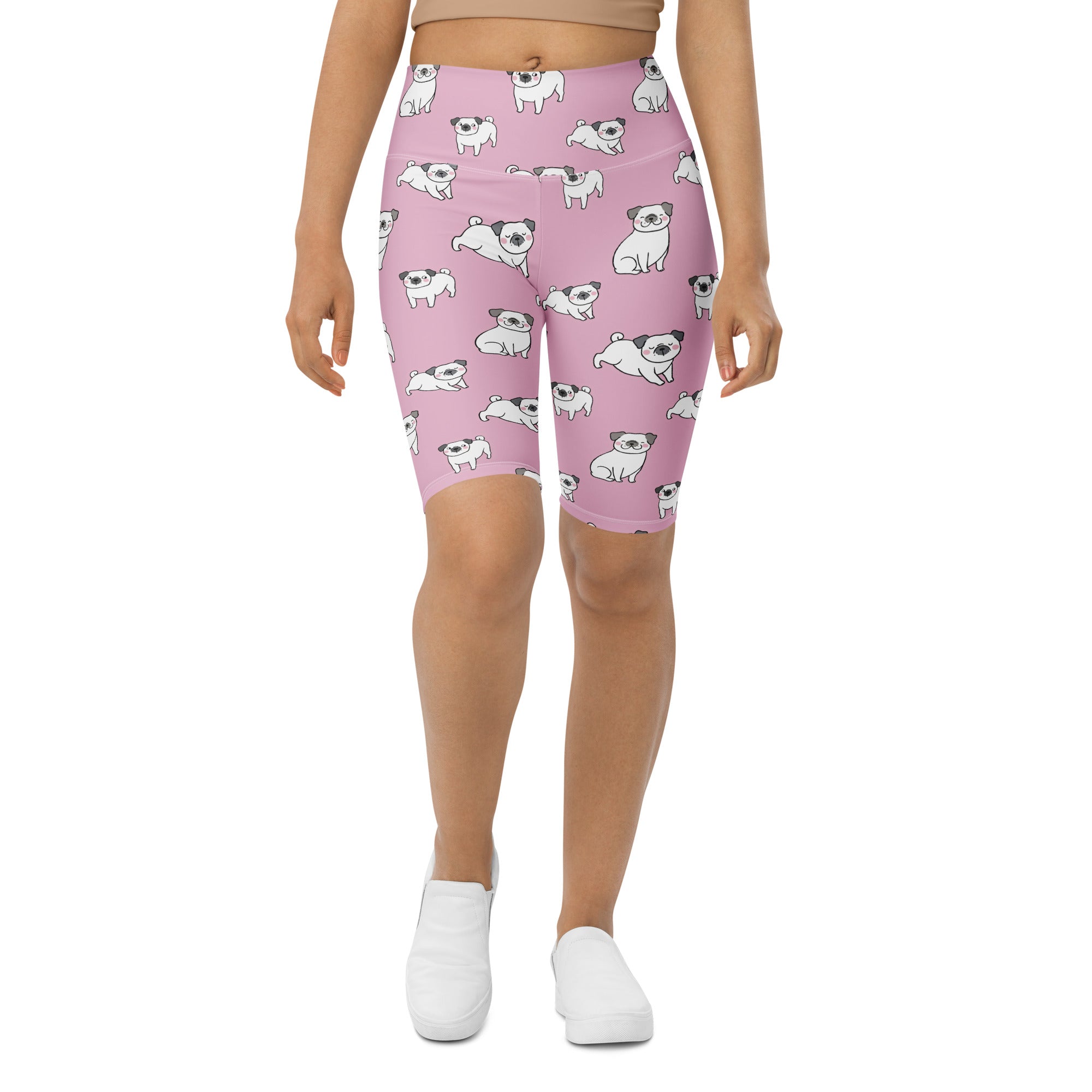Women’s pink high waisted biker shorts with white pug pattern moisture wicking active fit material