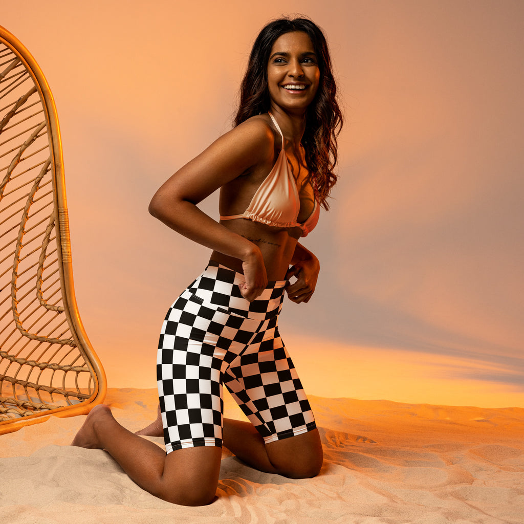 Women’s black and white checkered high waisted biker shorts with moisture wicking fabric for active fit