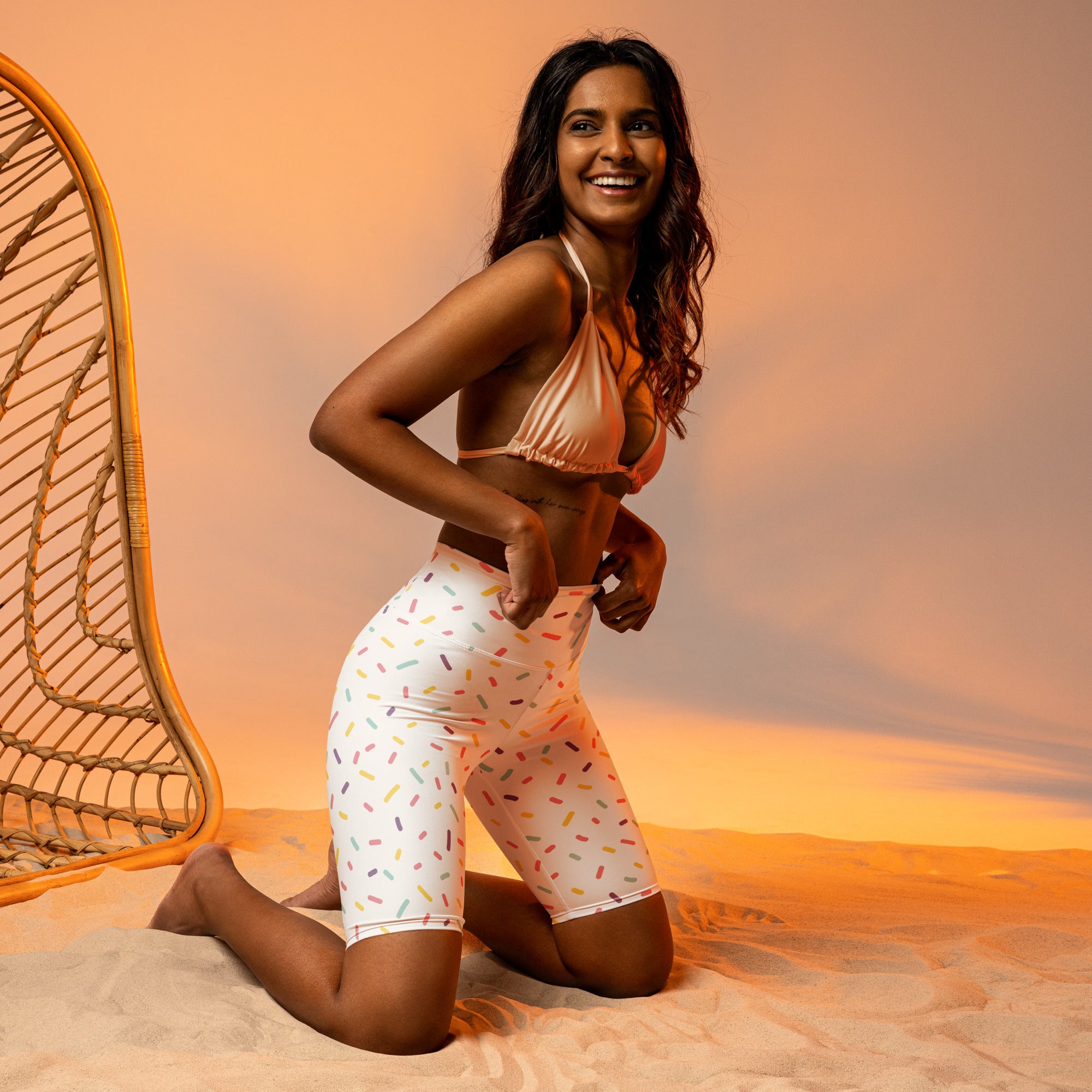 Women’s white high waisted biker shorts with colorful sprinkle print moisture wicking active fit