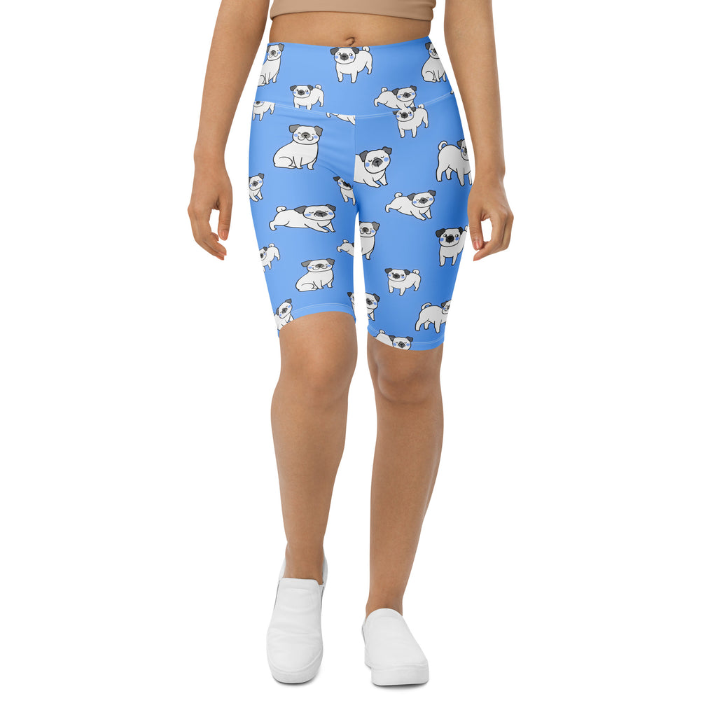 Women’s blue pug high waisted bike shorts with moisture wicking fabric and playful white cartoon pug pattern