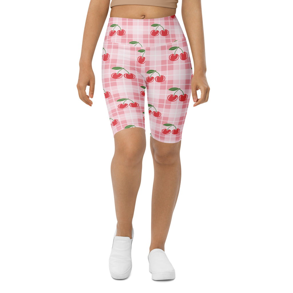 Women’s pink gingham cherry high waisted biker shorts with moisture wicking active fit and plaid pattern