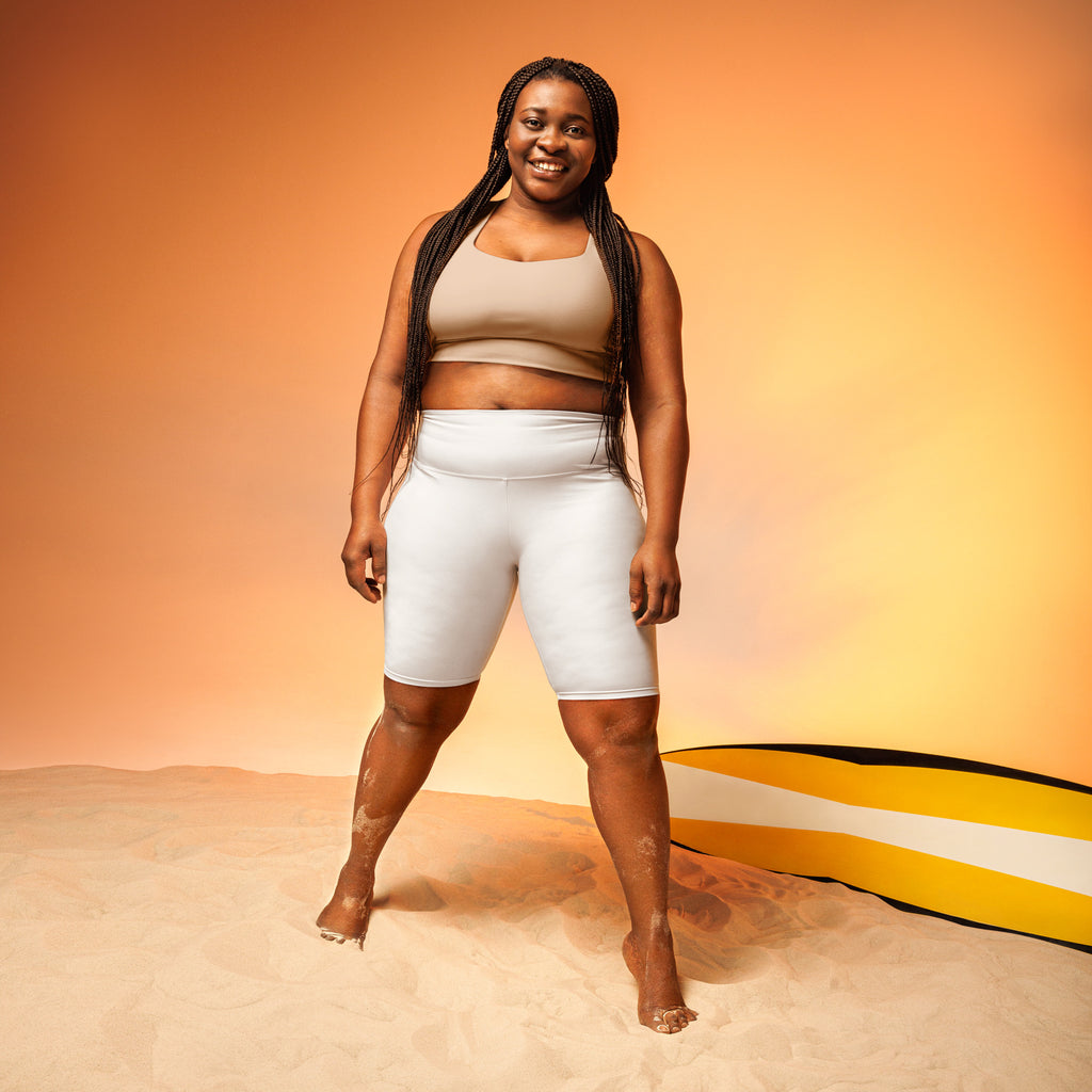 Women’s white high waisted biker shorts in moisture wicking fabric for active fit and comfort