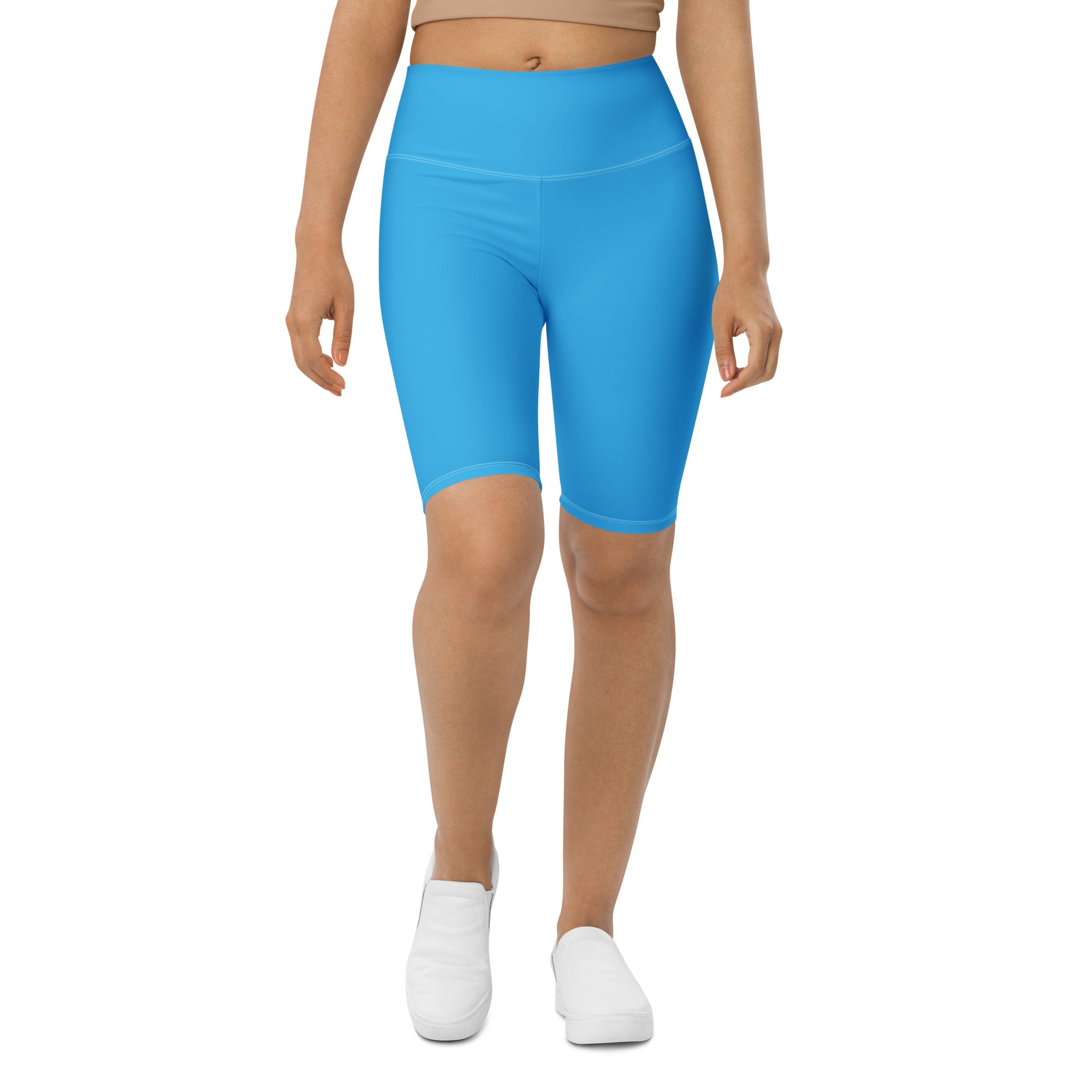 Bright blue high waisted bike shorts made of stretchy moisture wicking fabric for active fit performance