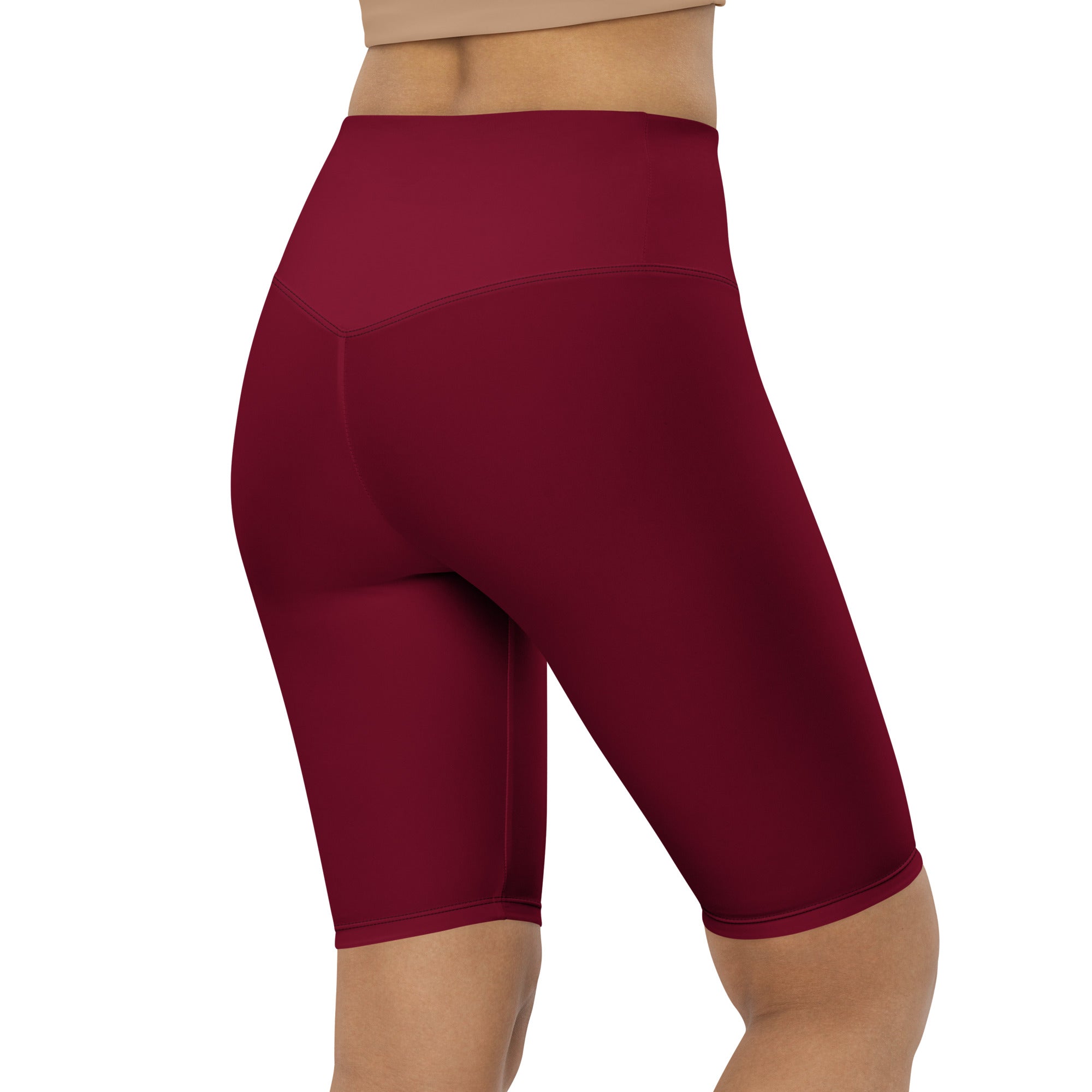 Women’s burgundy high waisted biker shorts with smooth stretchy fabric and moisture wicking active fit