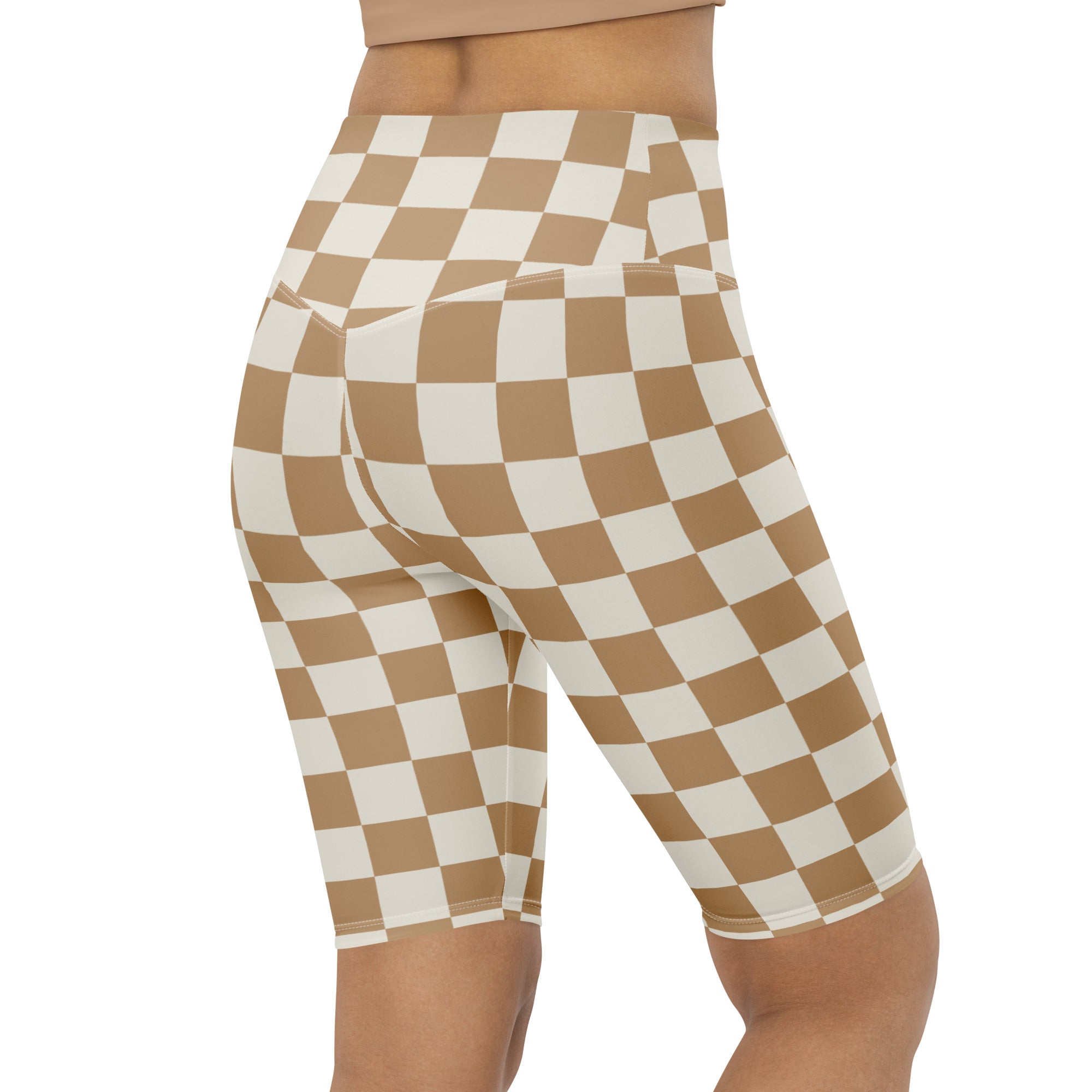 Women’s beige and white checkered high waisted biker shorts with moisture wicking active fit shown from the back