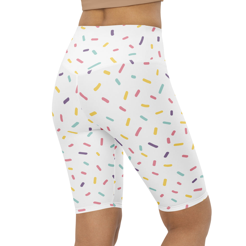 Women’s white high waisted moisture wicking bike shorts with colorful sprinkle print for active fit workouts