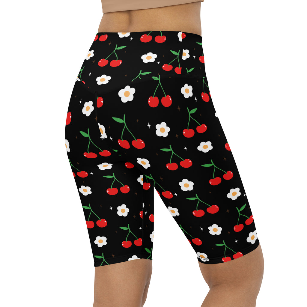 Women’s cherry blossom high waisted black bike shorts with red cherries and white daisies moisture wicking fit