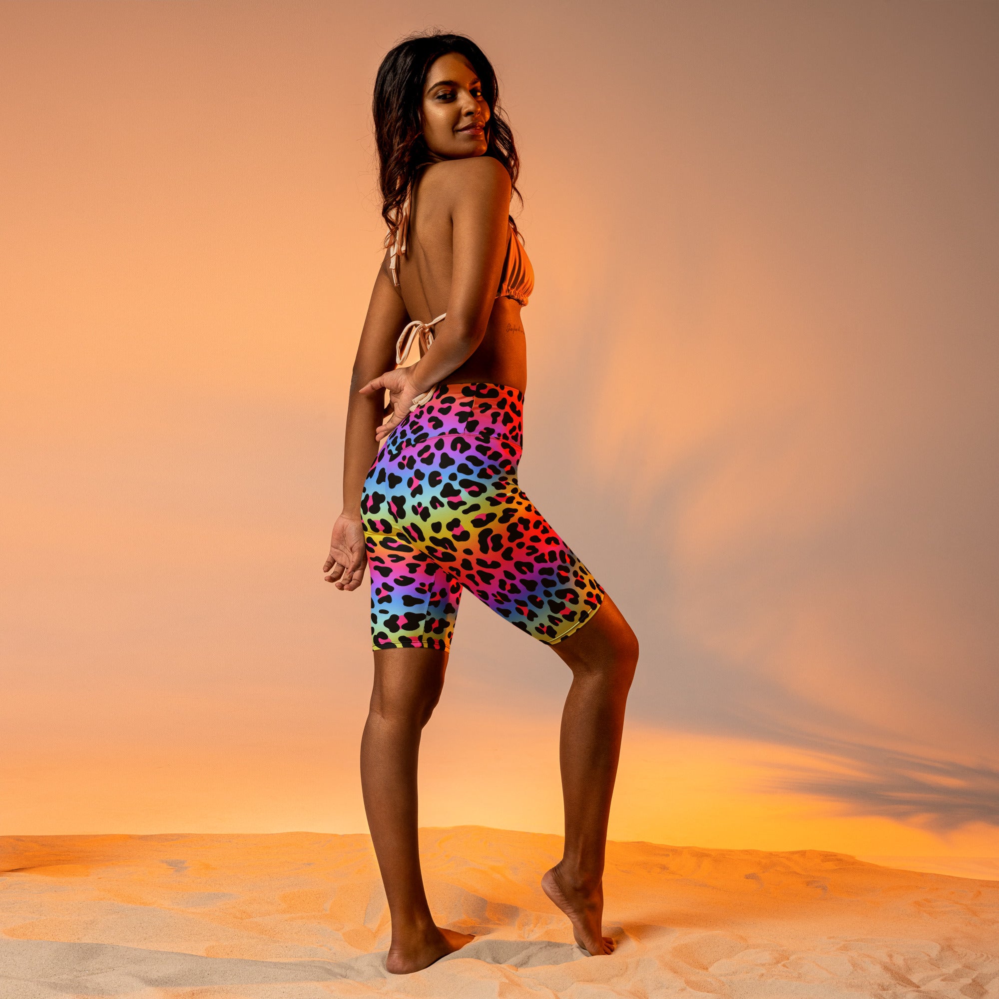 Women’s rainbow leopard high waisted biker shorts in moisture wicking fabric for active fit and comfort