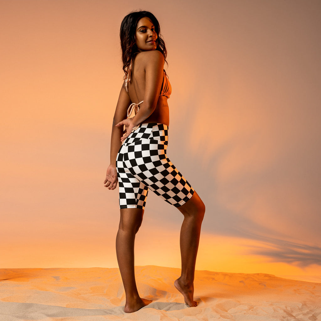 Women’s black and white checkered high waisted biker shorts with moisture wicking fabric for active fit