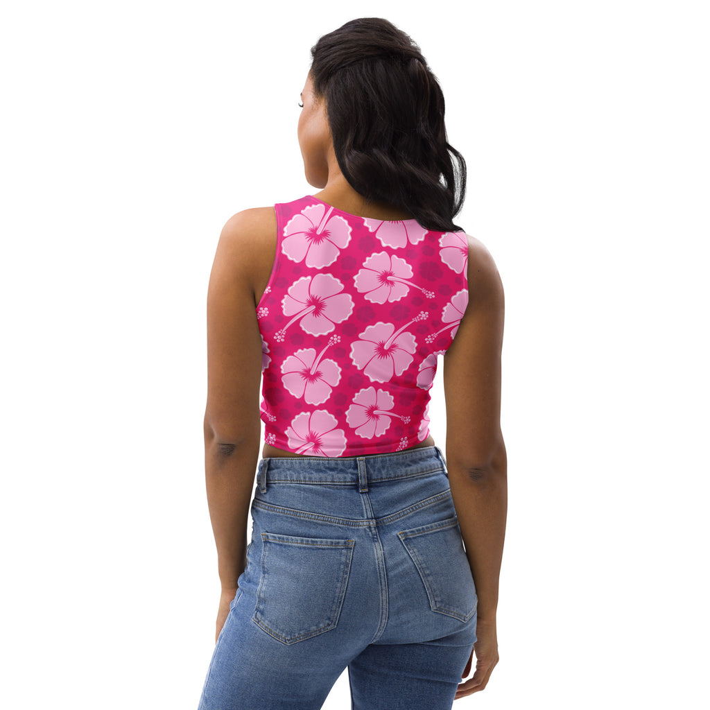 A vibrant pink sleeveless buttery soft crop top with light pink hibiscus flowers for women