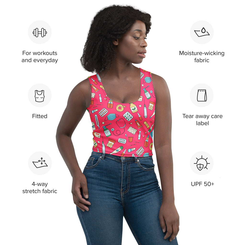 Women’s nurse-themed buttery soft crop top in vibrant pink with moisture-wicking 4-way stretch fabric and medical prints