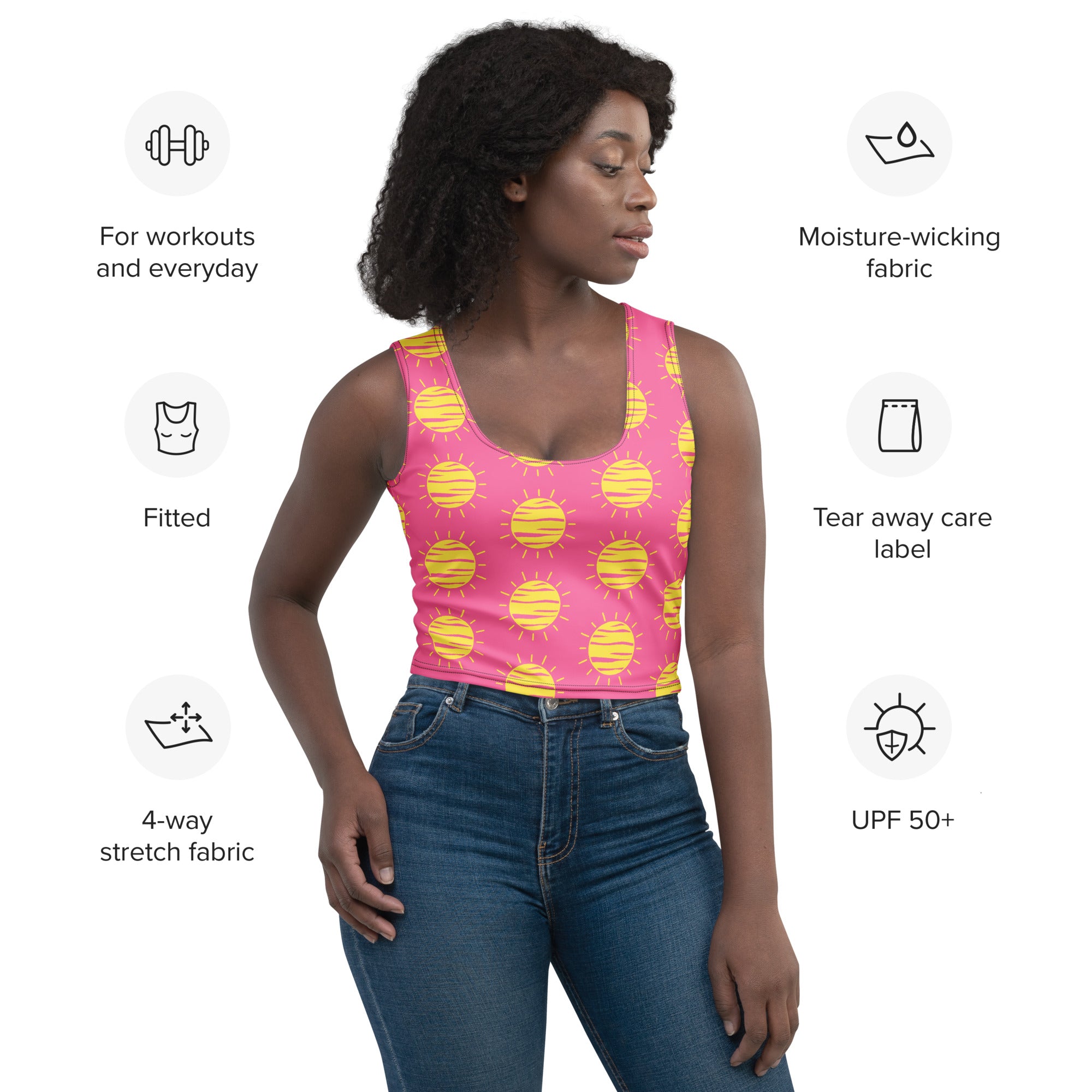 Women’s sunshine print buttery soft crop top in pink with sun pattern made of moisture-wicking 4-way stretch fabric