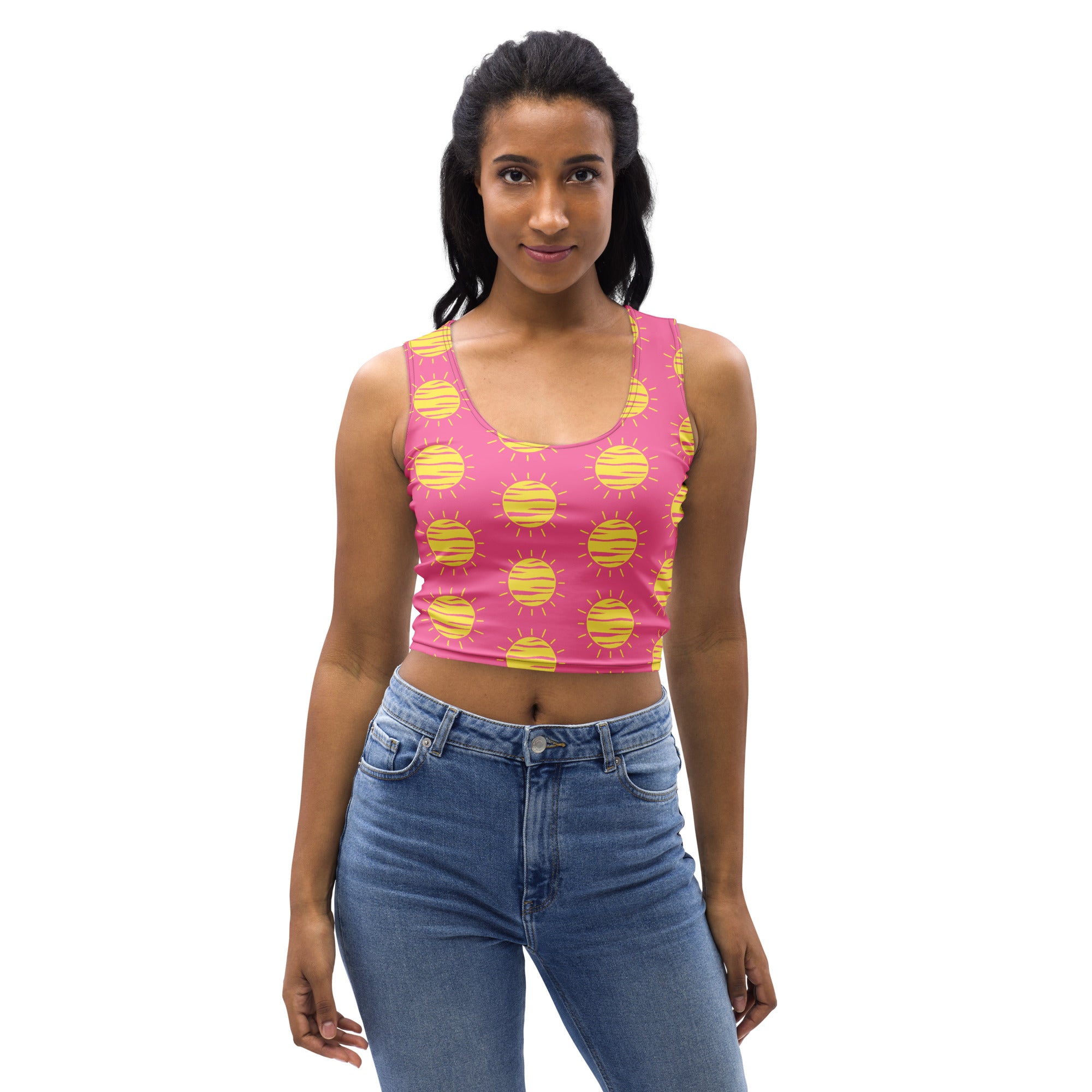 Pink women’s crop top with yellow sun print made from buttery soft fabric perfect for sunny days