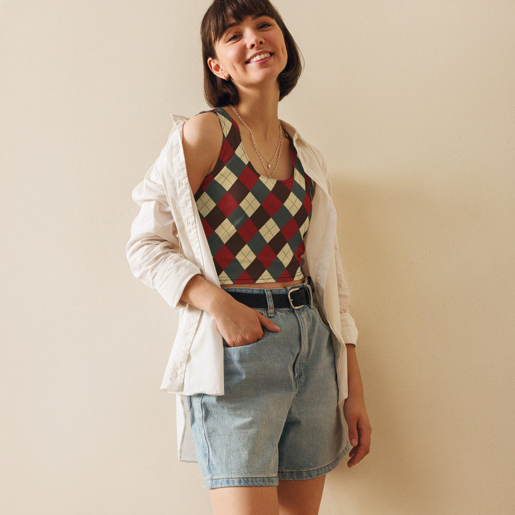 A woman wearing a women’s red and green plaid argyle buttery soft crop top with thin straps
