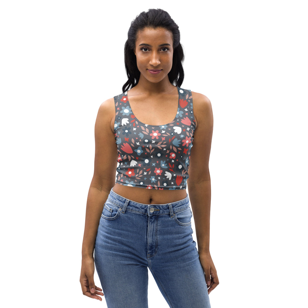 Women’s dark floral buttery soft crop top in dark gray with vibrant red pink and white blossoms and small star accents