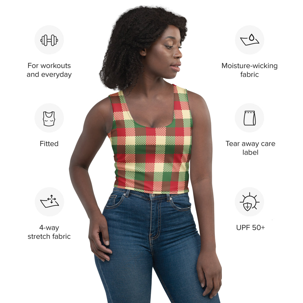 A fitted sleeveless crop top in red green and beige plaid made from moisture-wicking 4-way stretch fabric