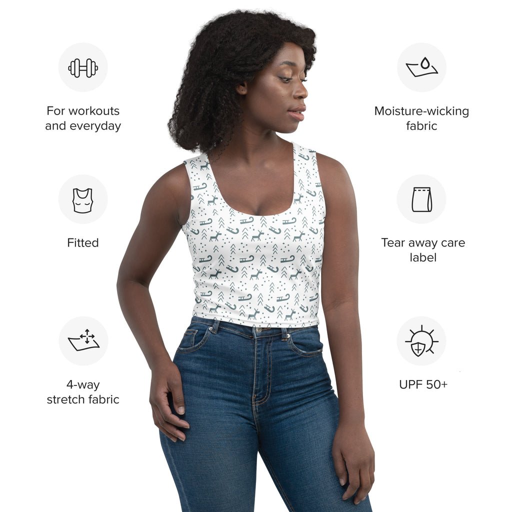 White buttery soft crop top with black and gray reindeer sleigh and arrow patterns for women