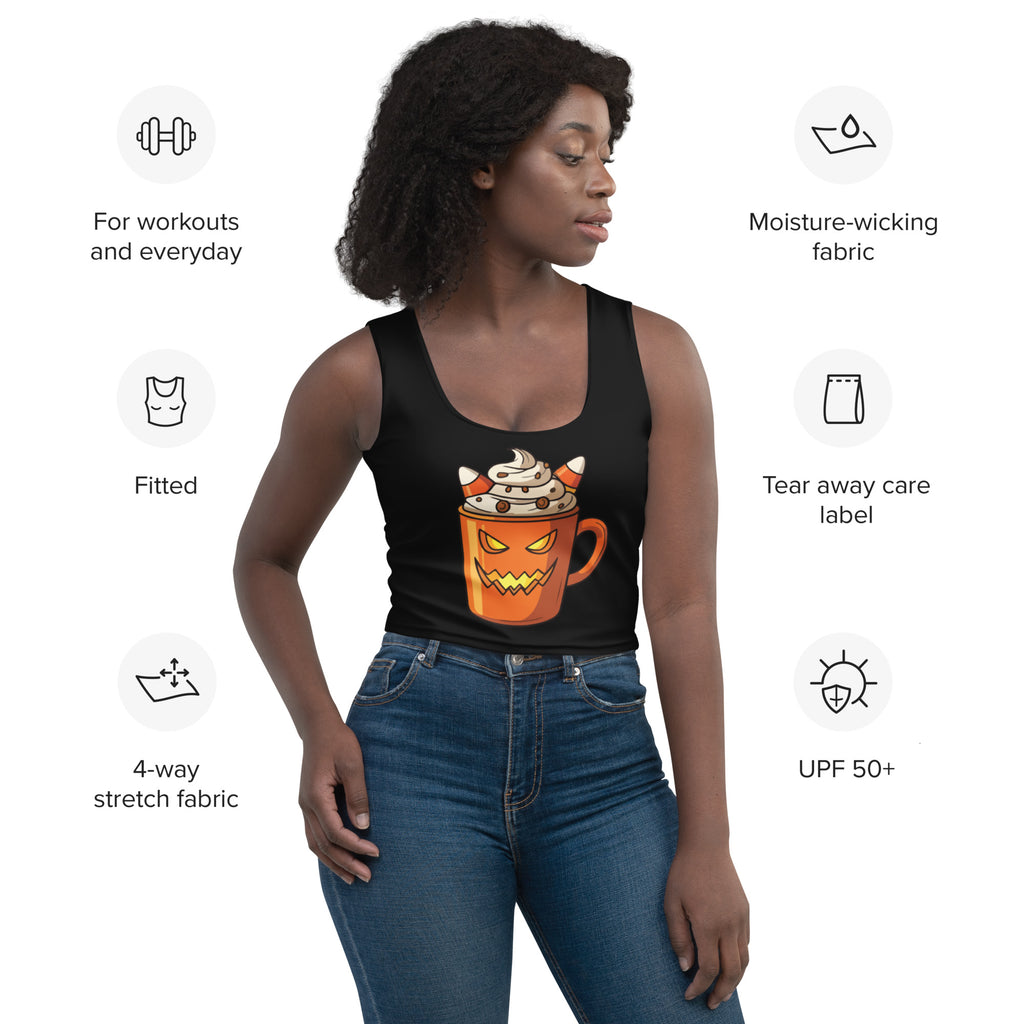 Black fitted buttery soft crop top with halloween pumpkin latte graphic featuring orange mug whipped cream candy corn