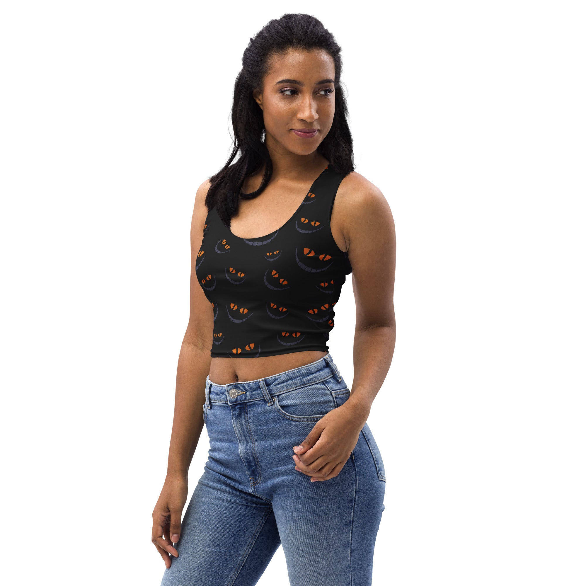 Women’s black buttery soft crop top with orange cat eye print for halloween themed outfits