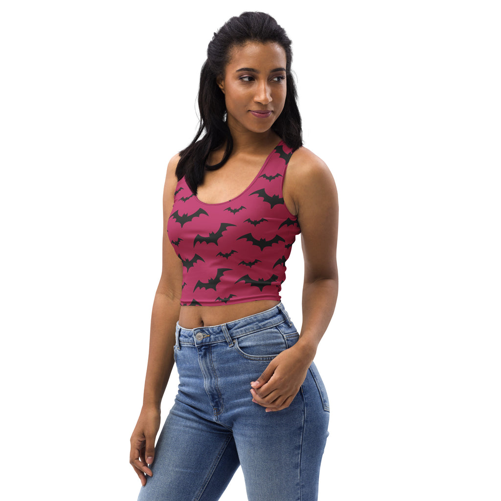 Women’s buttery soft pink crop top with black bat pattern perfect for Halloween festivities
