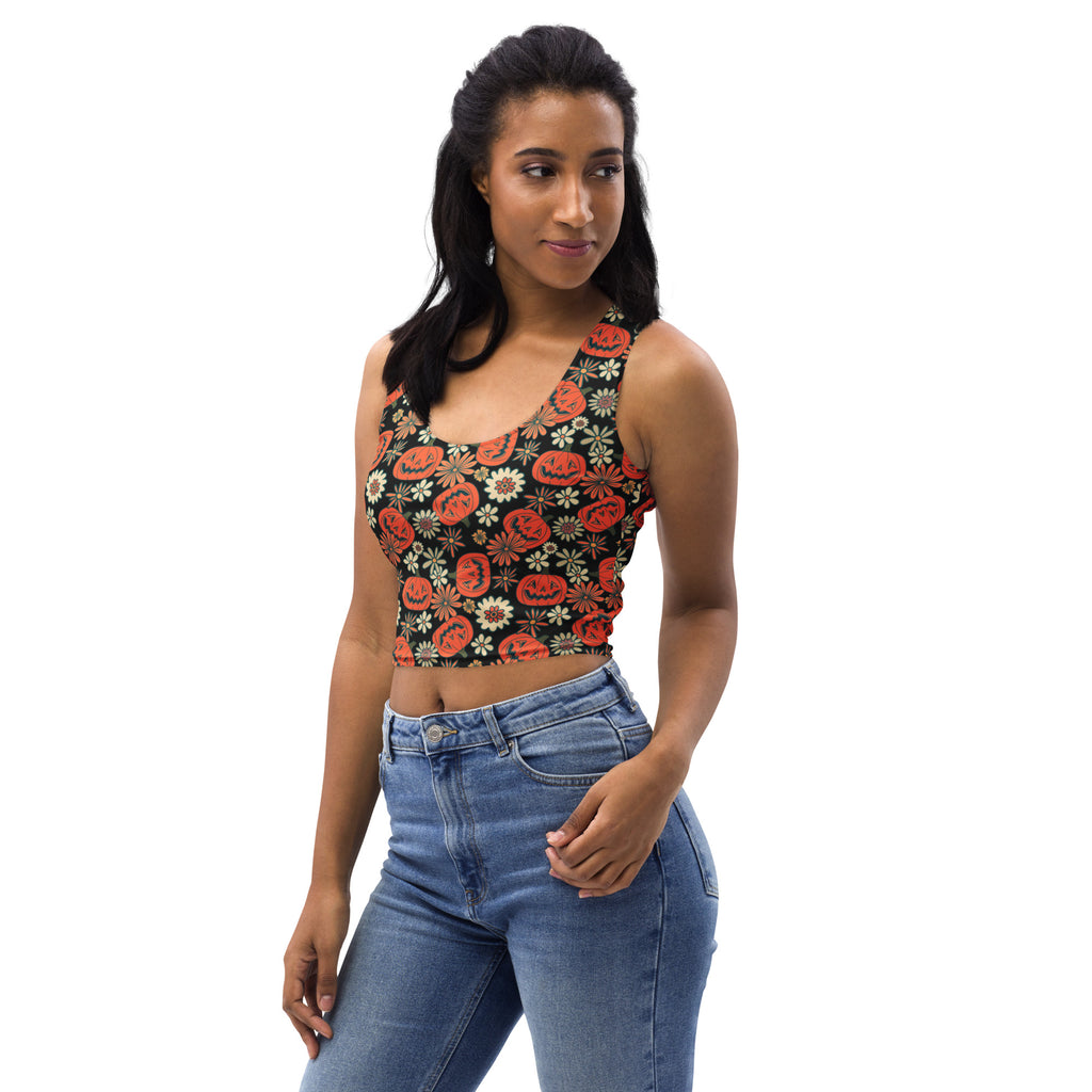 Women’s buttery soft black crop top with orange pumpkins and white floral vintage halloween pattern