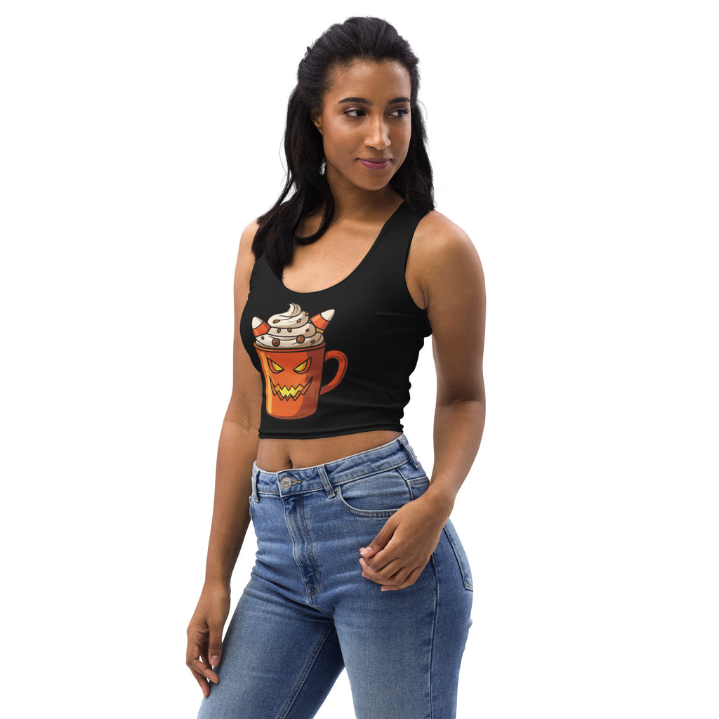 Black buttery soft crop top featuring a cartoon orange pumpkin mug with whipped cream and candy corn for halloween