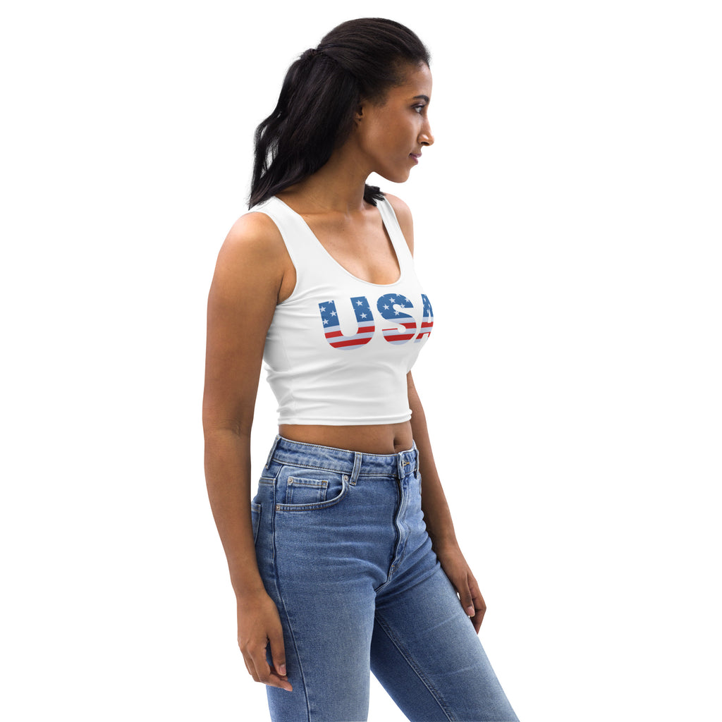 Women’s white buttery soft cropped tank top with usa printed in red white and blue flag design