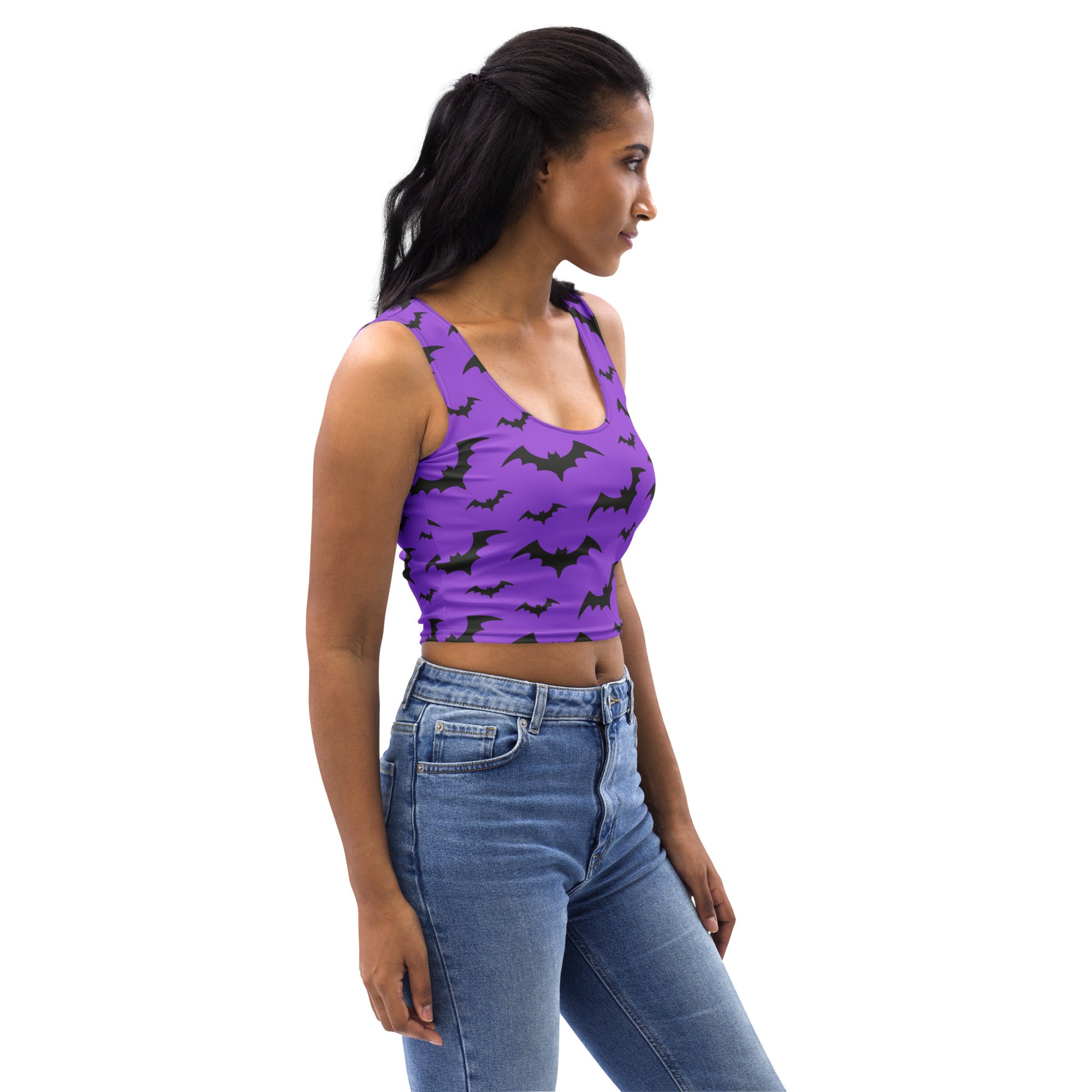 Women’s purple buttery soft crop top with black bat prints perfect for halloween festivities