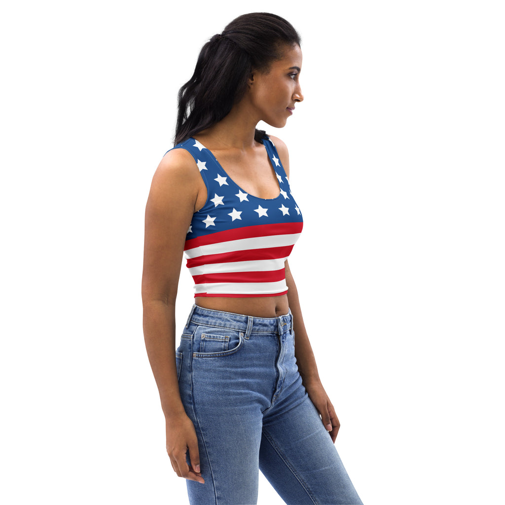 Women’s buttery soft cropped tank top with vibrant american flag design in red white and blue colors