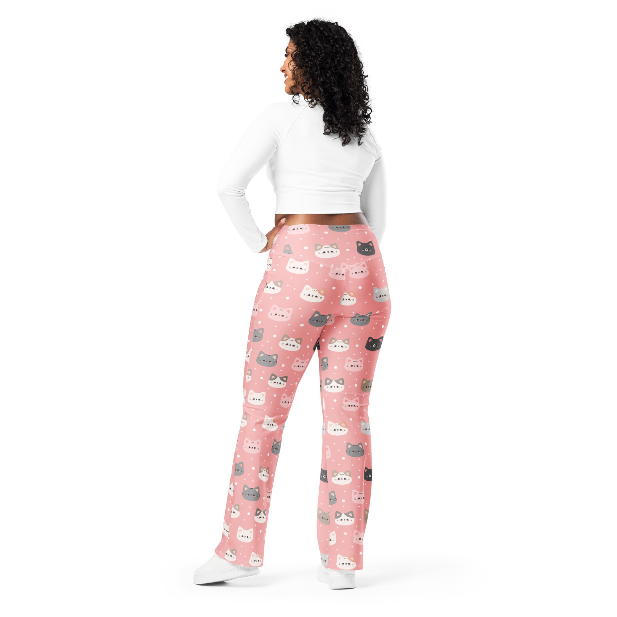 Women’s cute pink high waist flare legging pants featuring playful white and gray cartoon cat faces with polka dots