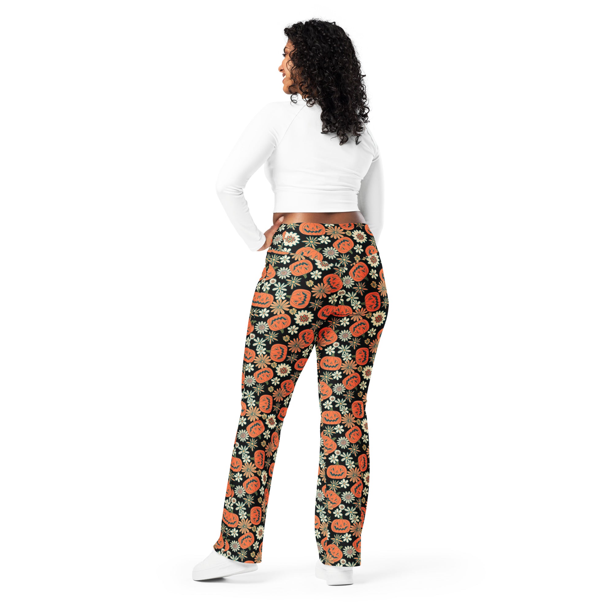 Women’s retro halloween high waist flare legging pants in black with vibrant orange pumpkin and white flower pattern