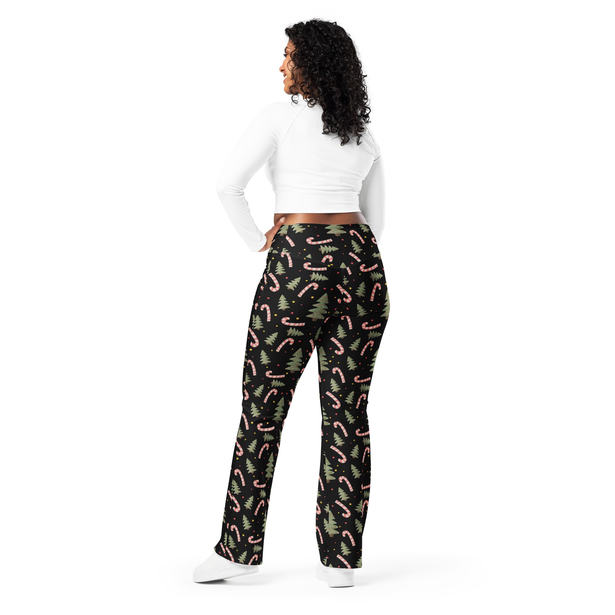 Women’s black Christmas candy cane high waist flare legging pants with pink candy cane and green pine tree pattern