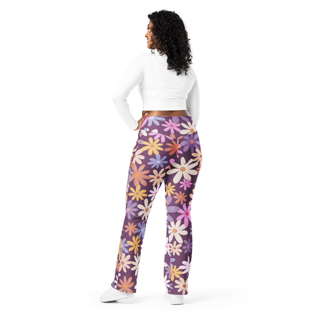 Women’s retro purple daisy high waist flare leggings with vibrant yellow pink and white floral pattern on dark purple background
