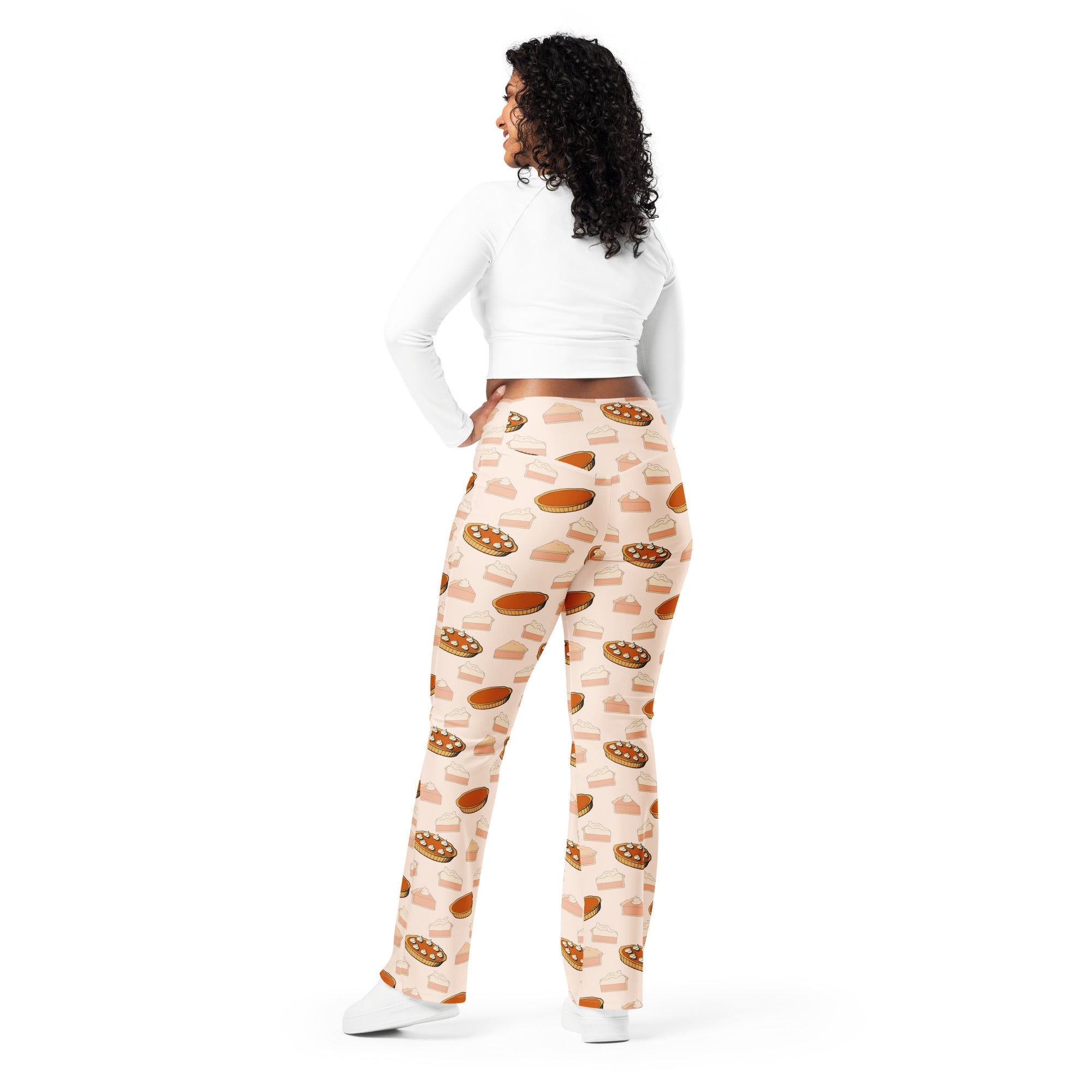 Women’s pumpkin pie thanksgiving high waist flare leggings in cream with playful pie slice print in warm brown and gold tones