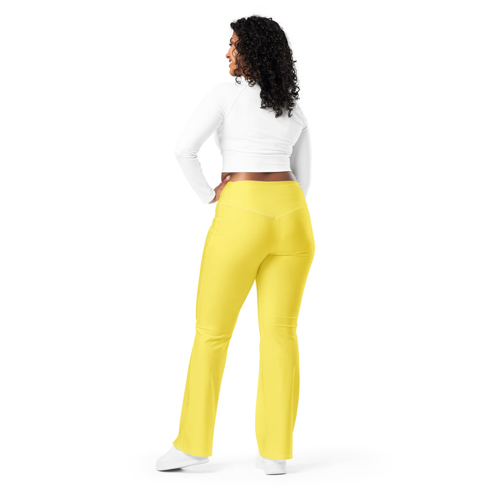 Women’s yellow high waist flare legging pants made of stretchy fabric perfect for casual or dressy occasions