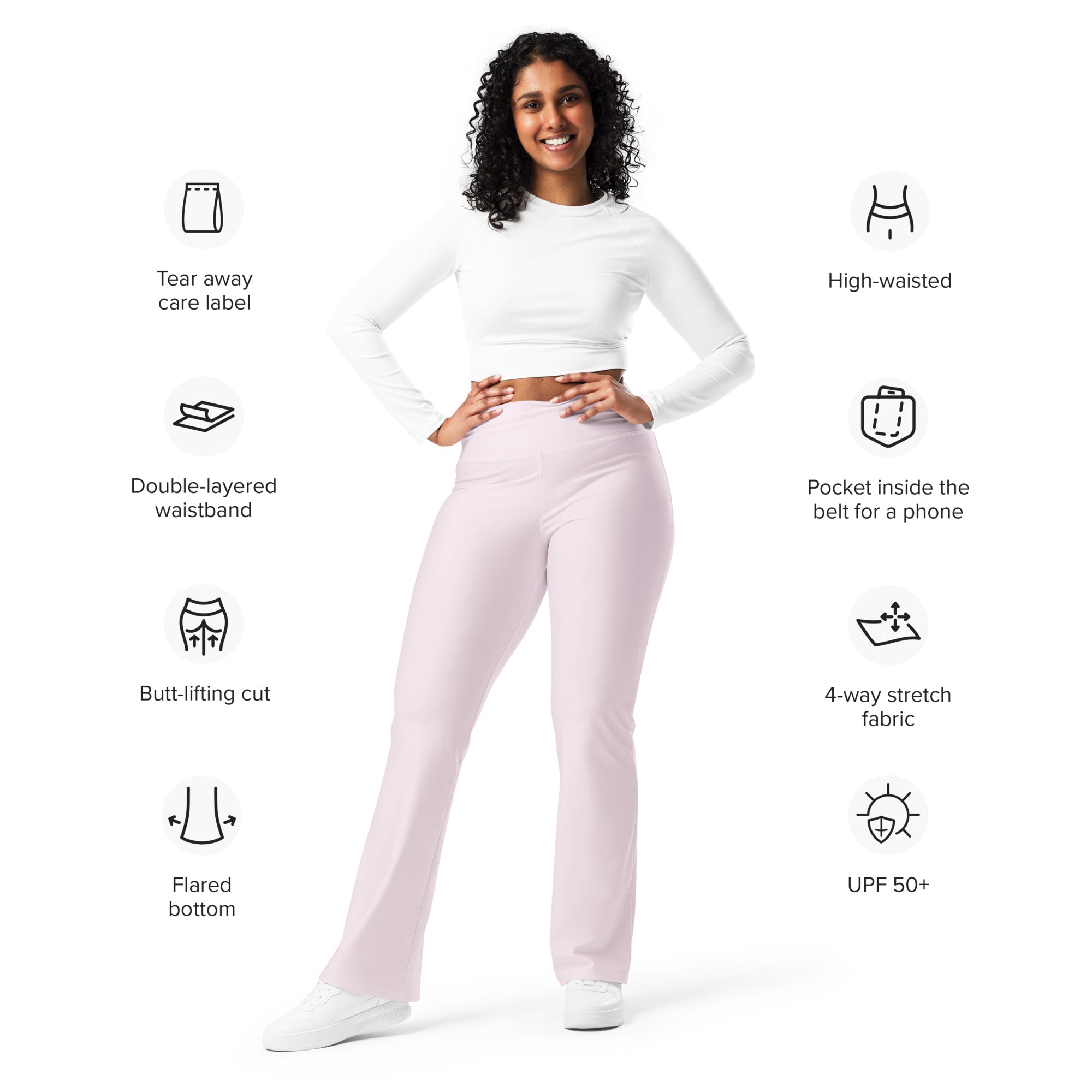 Women’s light pink high waist flare legging pants made from 4-way stretch fabric with double-layered waistband and phone pocket