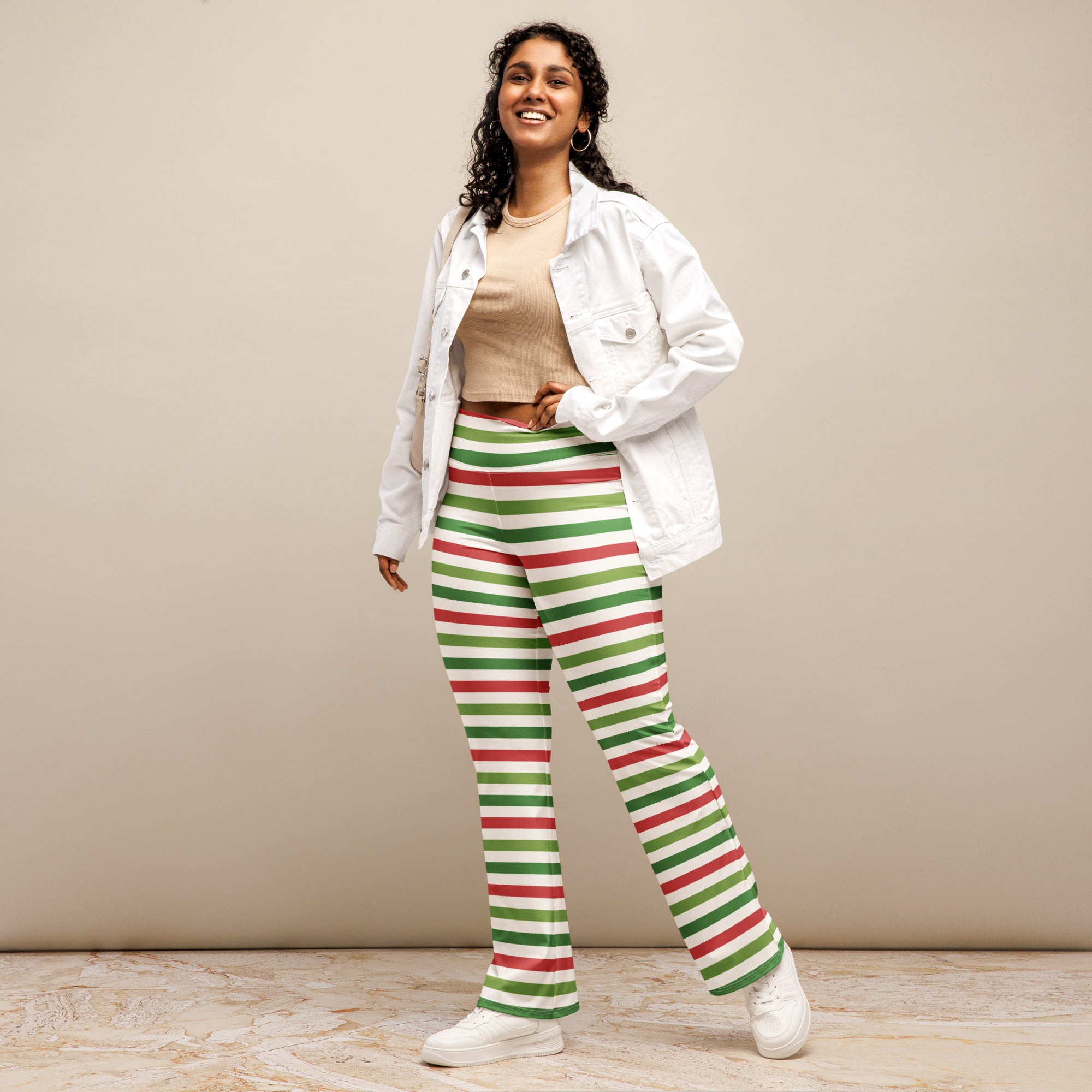 Women’s high waist flare legging pants in red and green striped pattern with flared wide legs