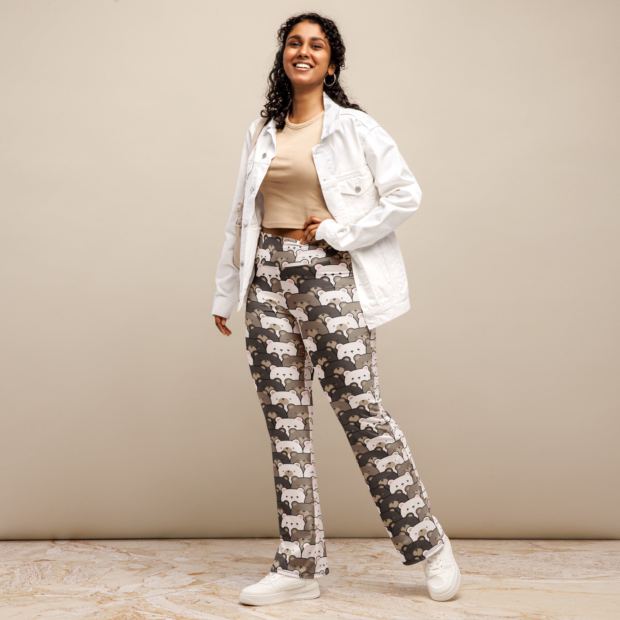 Women’s high waist flare legging pants with white and gray cartoon fox pattern on dark gray background