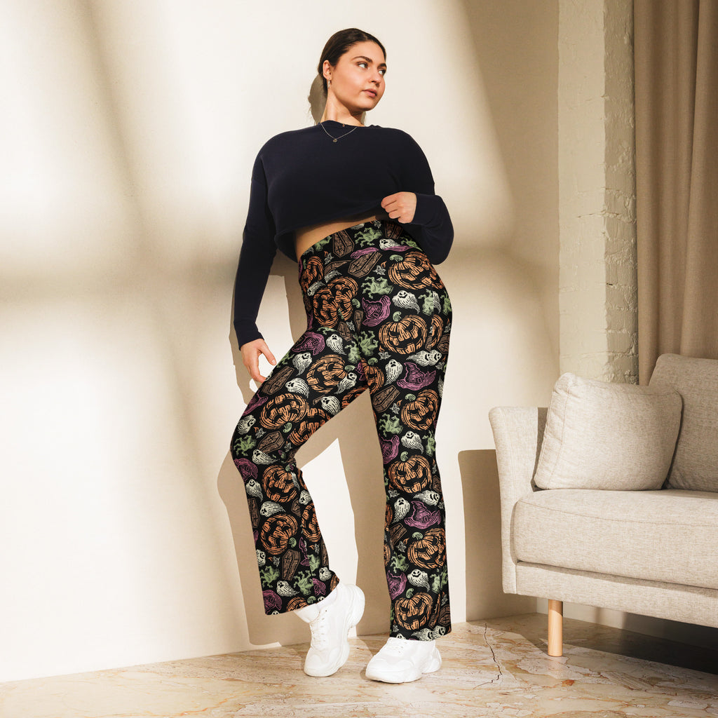 Women’s creepy halloween high waist flare legging pants in black with orange purple and green jack o lantern ghost and owl print