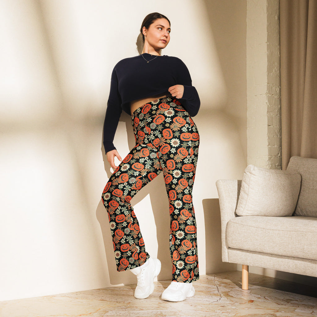 Women’s retro halloween high waist flare leggings in black with vibrant orange pumpkin and white flower pattern