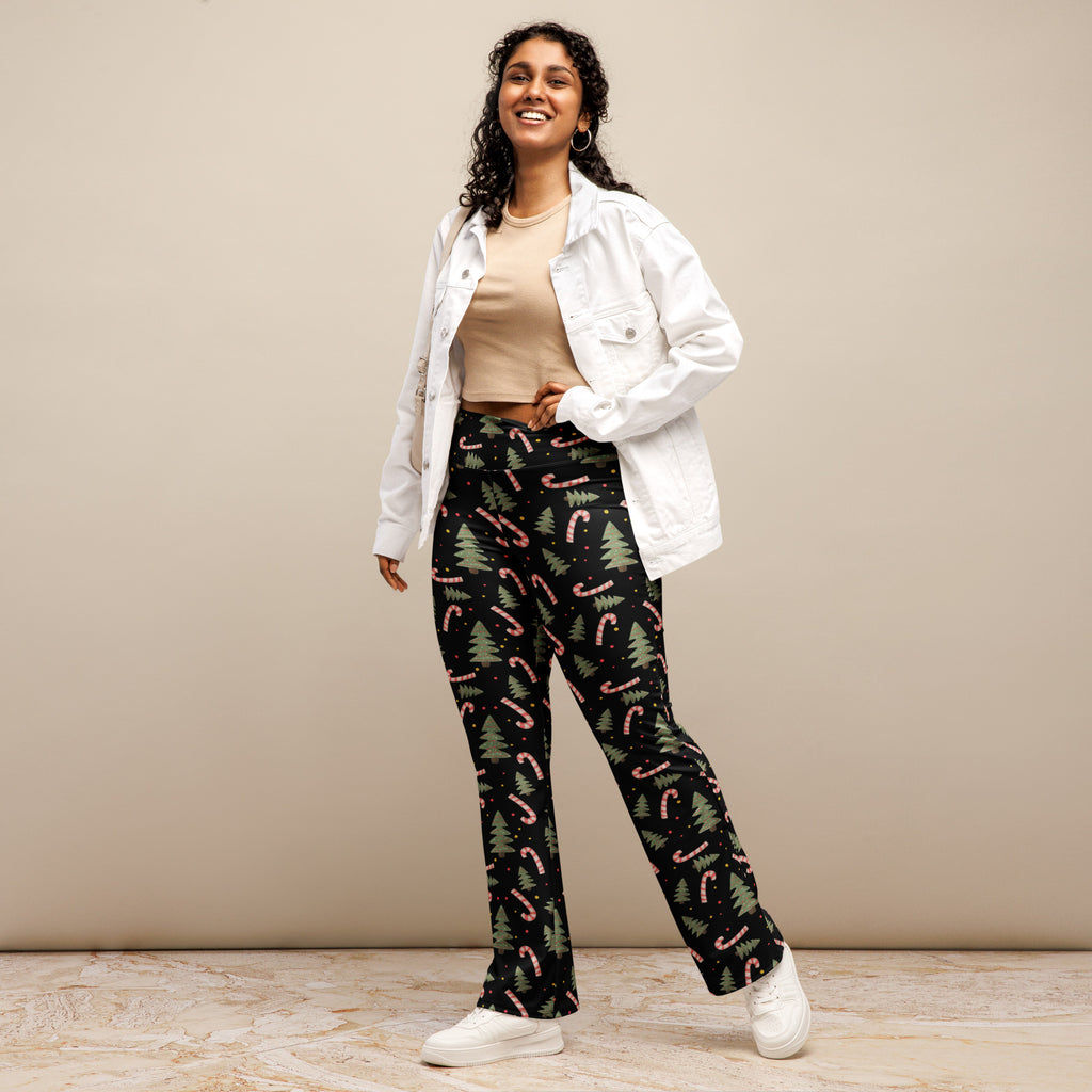 Women’s black christmas candy cane high waist flare pants with green pine tree and pink candy cane pattern