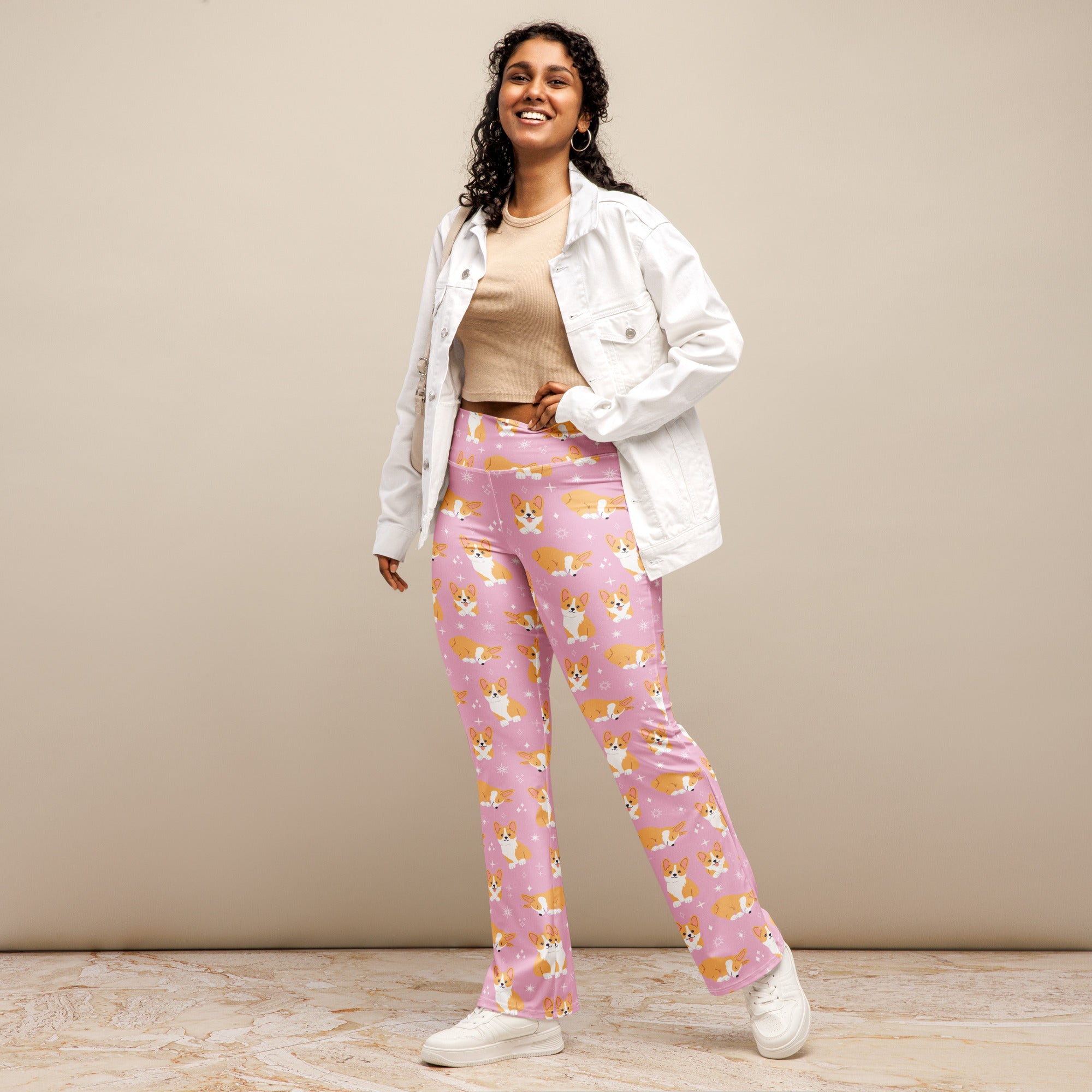 Women’s pink corgi dog high waist flare legging pants featuring a playful dog pattern and stretchy comfortable fabric
