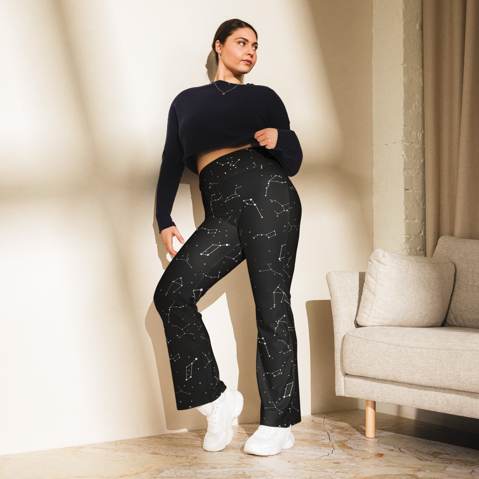 Women’s black plus-size high waist flare pants with realistic white constellation star and line print